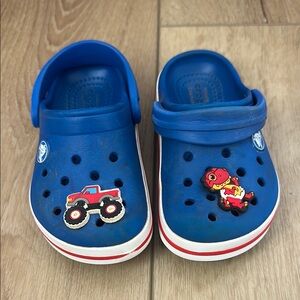 CROCS Kids' Blue Clogs with Truck and Dinosaur Charms
